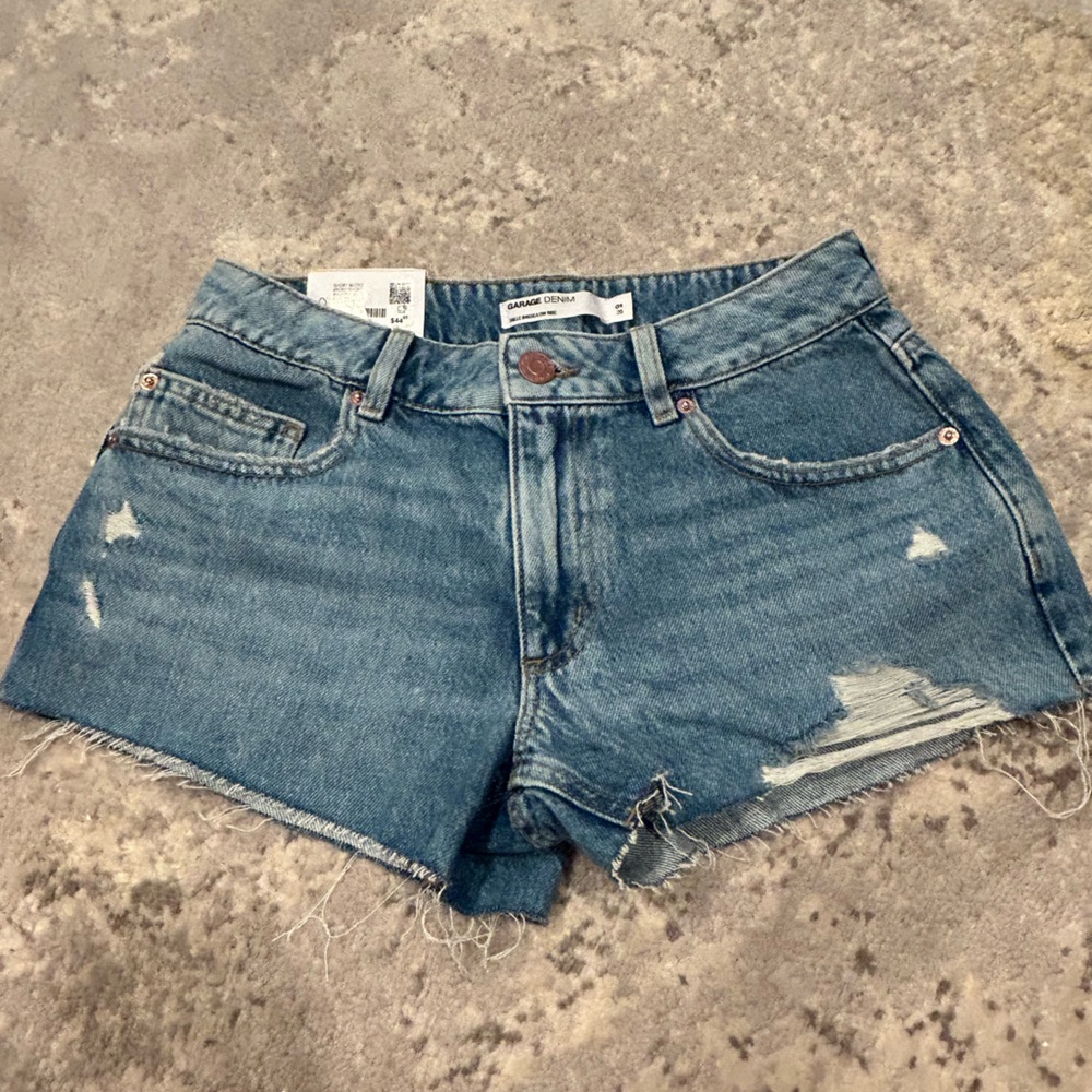 Light blue Garage denim jean shorts. 25